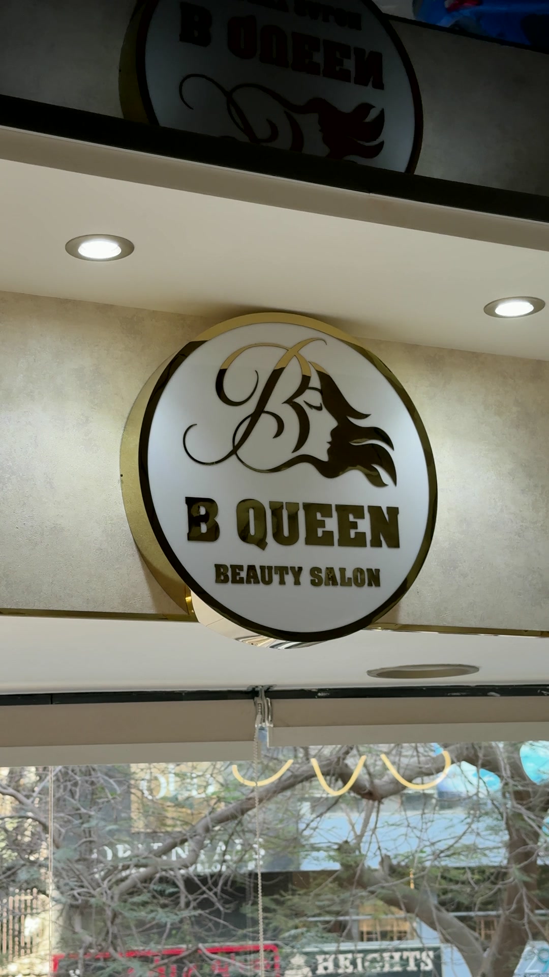 The BQueen logo inside the salon